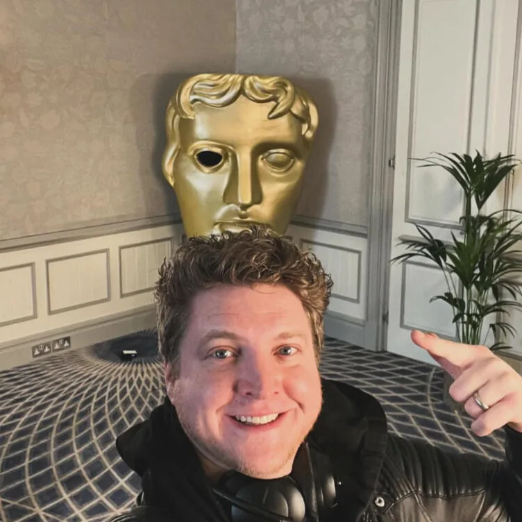 Selfie in a BAFTA mask at the BAFTA awards